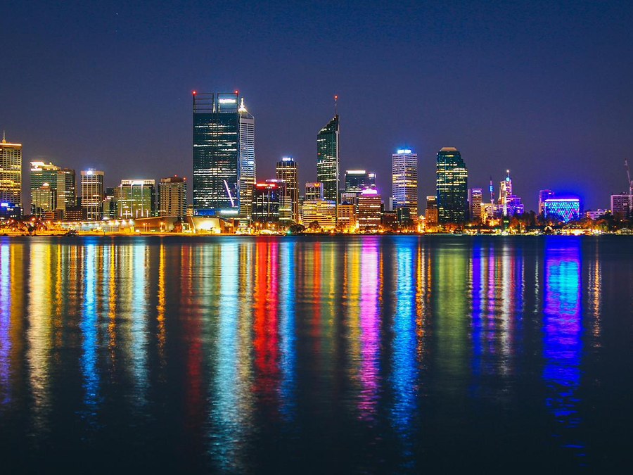 Perth skyline reflected in the Swan River at night